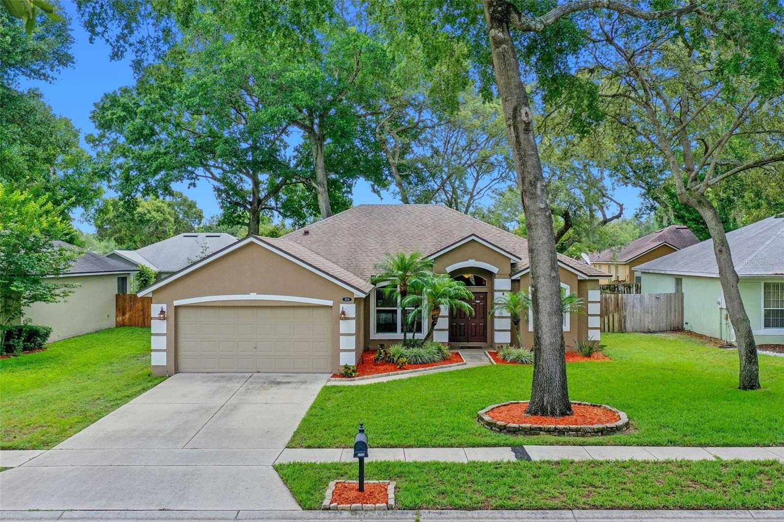 Welcome to Prairie Lake Village, where tree-lined streets and a welcoming community set the stage for this beautifully updated, block-constructed SINGLE-STORY home. With over 1,600 square feet of living space, this 3-bedroom, 2-bath retreat features a desirable SPLIT FLOOR PLAN, combining thoughtful updates with timeless comfort. Inside, an open, LIGHT-FILLED layout and fresh neutral palette create an inviting backdrop for everyday living. The kitchen shines with GRANITE COUNTERTOPS, slate appliances, and plenty of room for gathering. The OVERSIZED PRIMARY suite feels like a private getaway with its NEWLY REMODELED, spa-inspired bathroom, featuring a DOUBLE SINK VANITY, soaking tub, separate shower, and walk-in closet. Step outside through French doors to your own backyard oasis. Designed for both relaxation and entertaining, the FULLY FENCED yard boasts lush landscaping, a paver patio, and a COZY FIREPIT—perfect for enjoying Florida evenings under the stars. With LOW HOA dues, easy access to major roads, medical care, shopping and restaurants, this is a great place to call home! ROOF 2018. WATER HEATER 2021. AC motor 2018.
