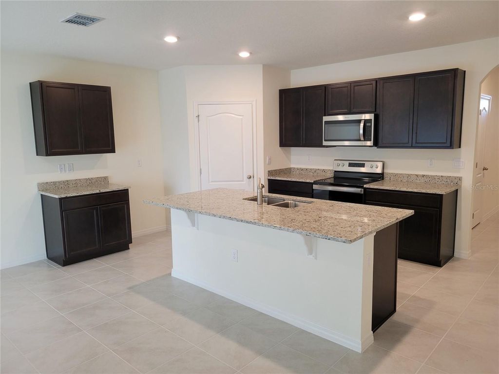 Photo of 1332 Sugarwood Street, Davenport, FL 33837 (MLS # O6388457)