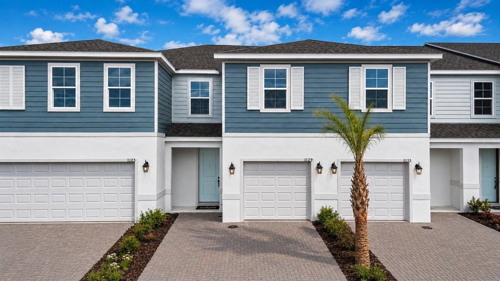 Photo of 701 Florida Elm Court, Deland, FL 32720 (MLS # W7889170)