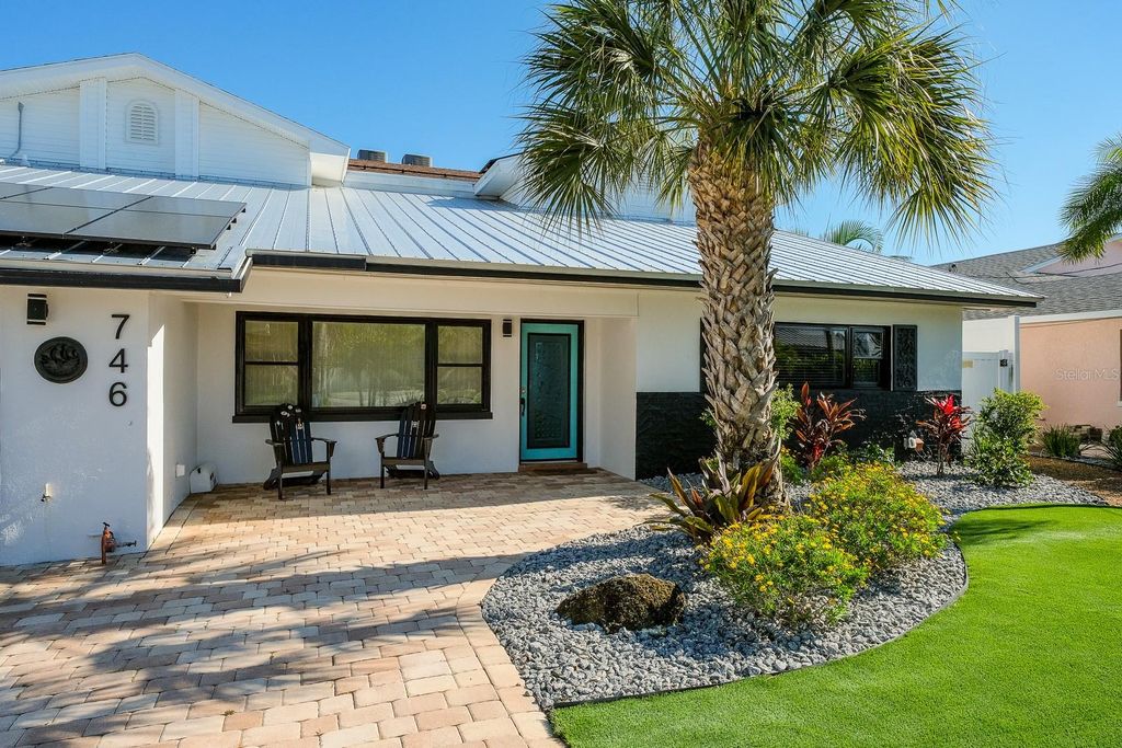 Photo of 746 Boca Ciega Isle Drive, St Pete Beach, FL 33706 (MLS # TB8432996)