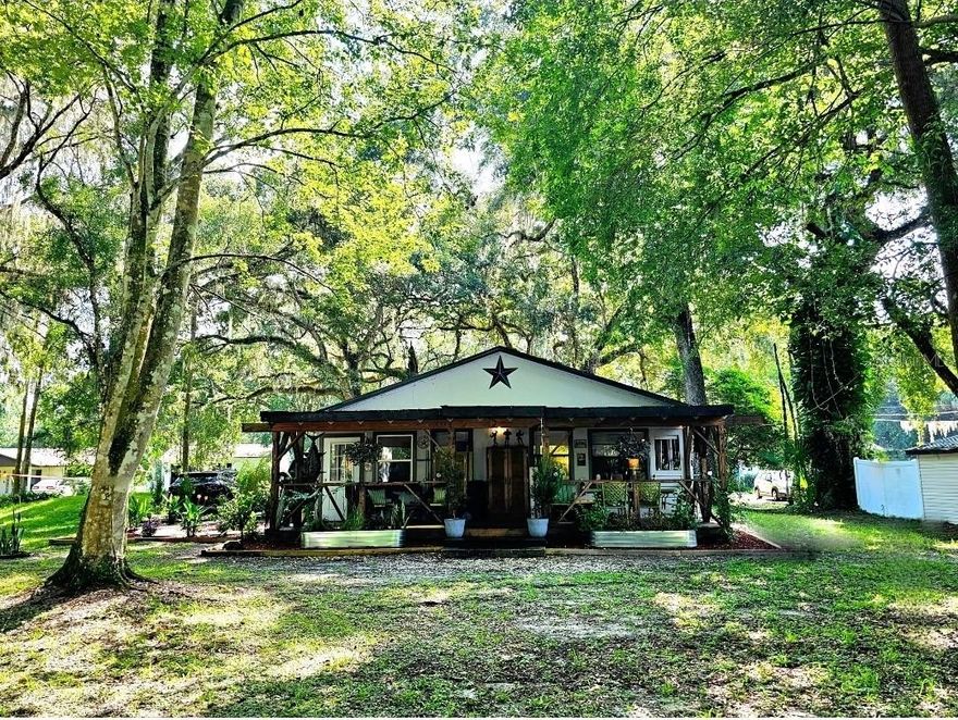 Looking for your piece of Florida paradise? Well here it is!! Check out this beautiful oasis nestled along side the Withlacoochee River. Fish or kayak right from your backyard canal, which is less than 500 ft from the main river. The world slows down the moment you step onto the property. It feels like a private retreat tucked away from the noise and demands of everyday life, yet the comfort of convenience is never far. You’re only a coupe miles from town, where shops, dining, and community events are easily within reach. This home offers a 2024 roof and a 2023 HVAC, recent updates to the kitchen and bath and beautiful flooring throughout. The functional layout is open and airy with 2 spacious bedrooms and inside laundry. The entrance foyer also doubles as a great office or sitting area to enjoy your favorite book. The spacious porch that spans the length of the home is an area dreams are made of. Overlooking the back yard to the water and trees beyond sets the tone for any get together or just quiet moments of reflection. Whether you're looking for your next home, a seasonal home or an income producing AirBnB/VRBO, this is the place for you. It's ready for it's next lucky owner to just come and enjoy everything about it. Call me for a tour. I love showing this place off! (The water in the river is very low currently. I've added photos of the home when the river is at normal level for reference.)