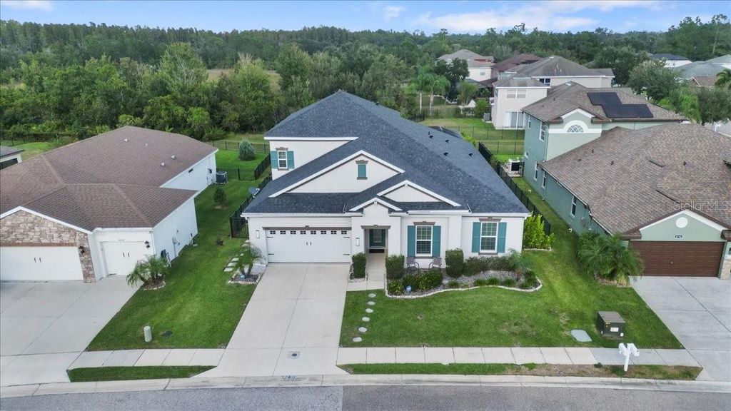 Photo of 4802 Butler National Drive, Wesley Chapel, FL 33543 (MLS # TB8438834)