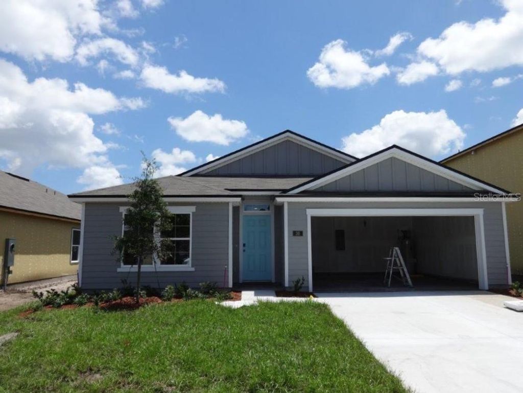 Photo of 30 SUMMERWOOD ROAD S, PALM COAST, FL 32137 (MLS # FC291219)