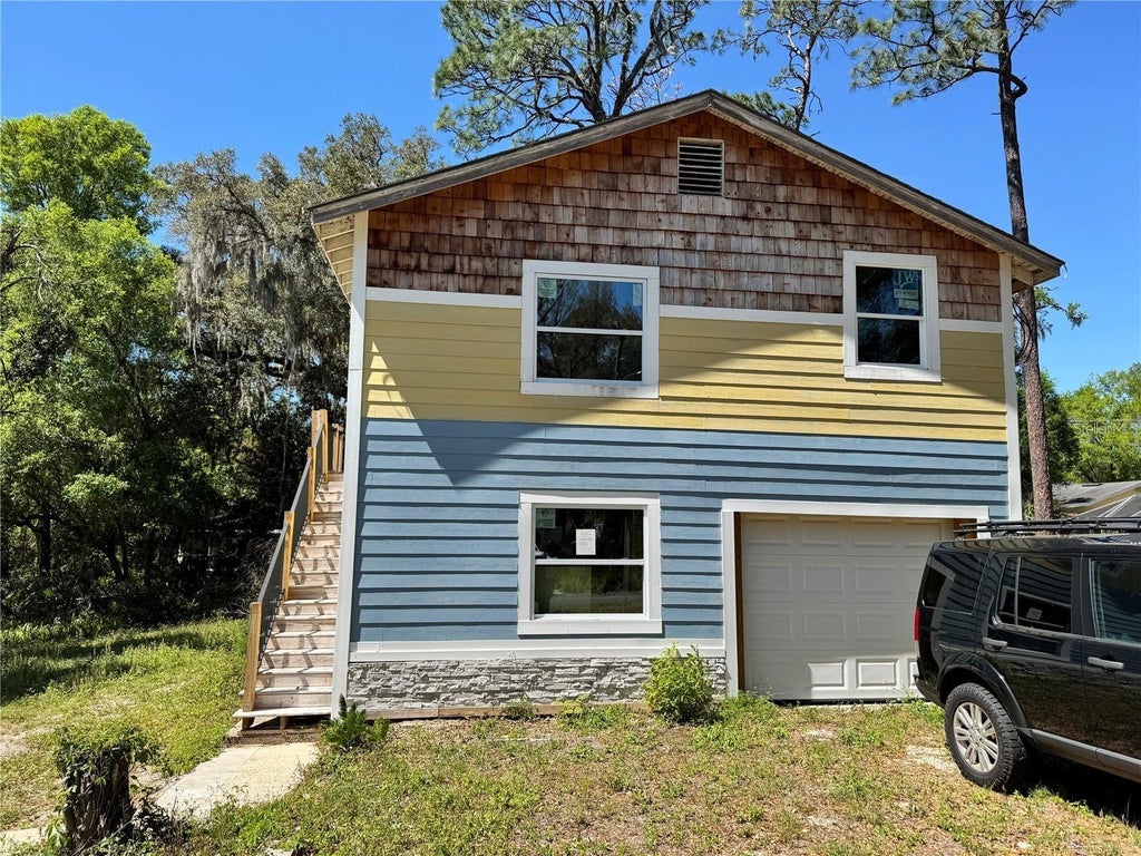 Photo of 737 E Indiana Avenue, Deland, FL 32724 (MLS # O6443821)