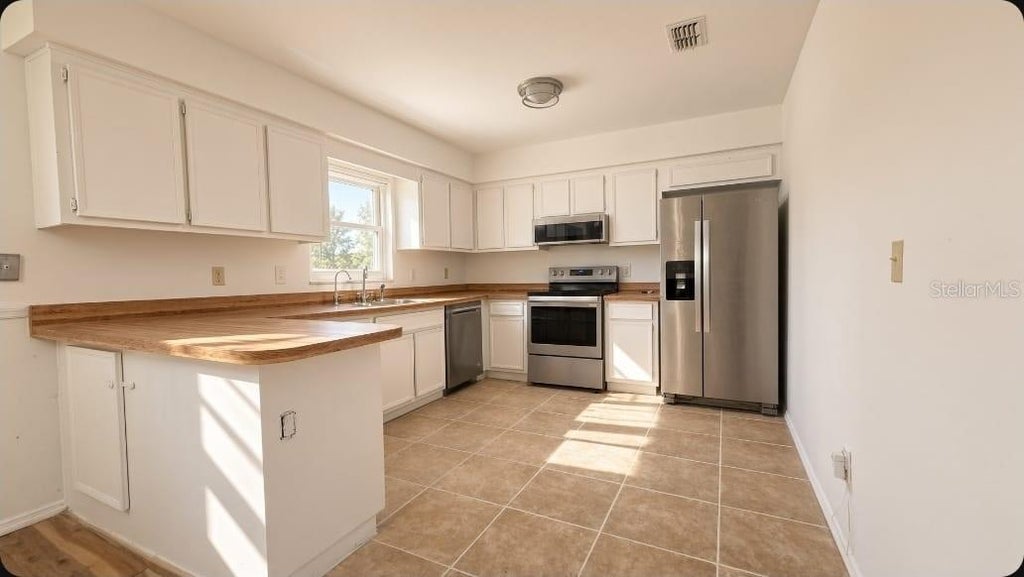 Photo of 128 Wax Myrtle Drive, Sanford, FL 32773 (MLS # S5159696)