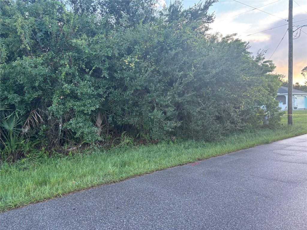 Photo of 1087 Kennwood Avenue, Port Charlotte, FL 33948 (MLS # C7515936)