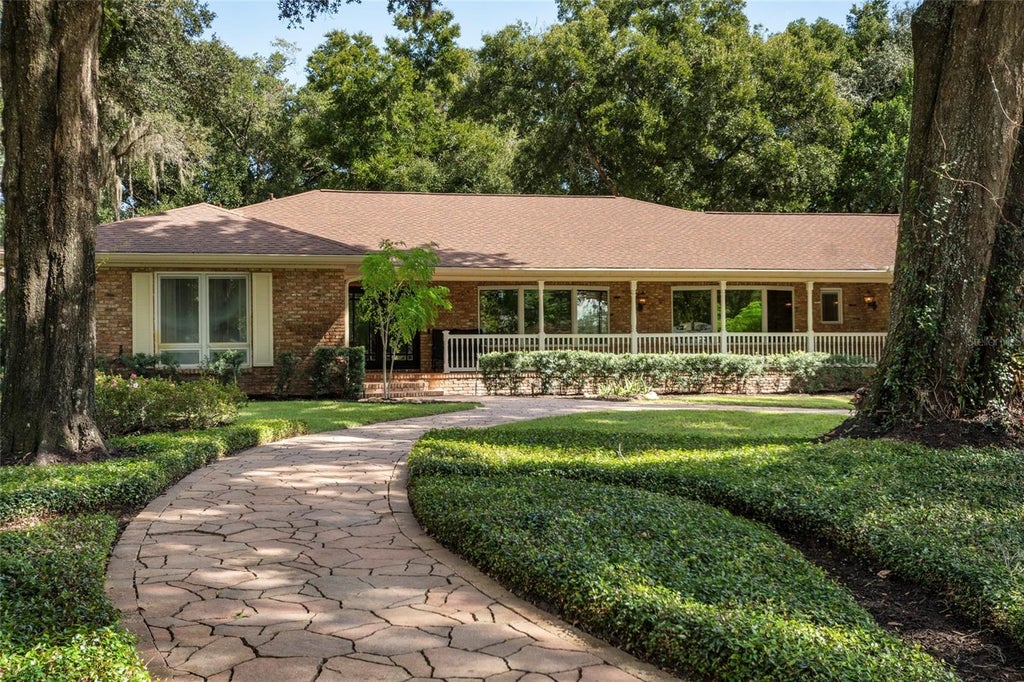 Photo of 2009 Woody Drive, Windermere, FL 34786 (MLS # O6422132)