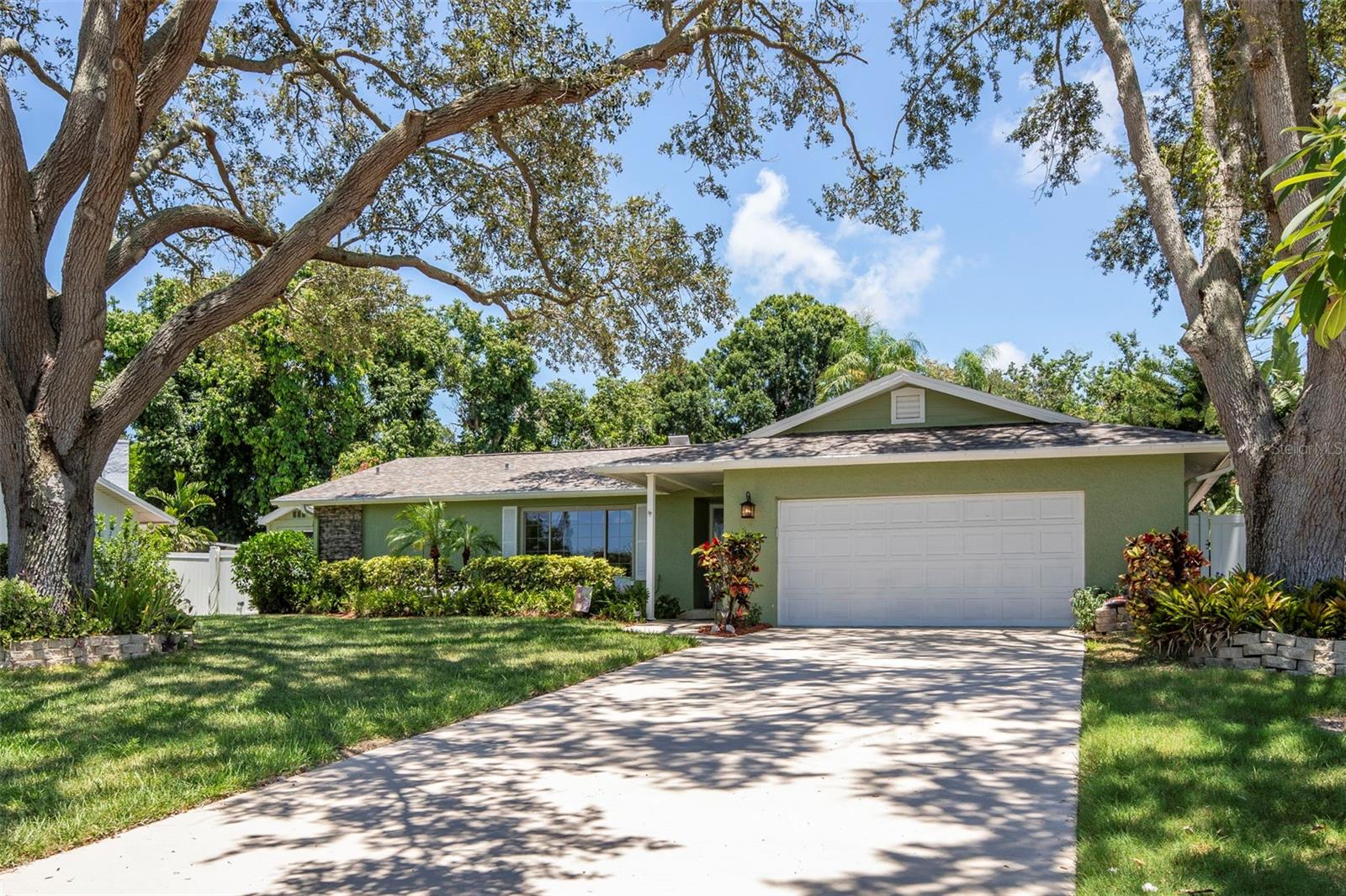 One or more photos were virtually staged.
Welcome to your Florida dream home! This beautifully maintained 3-bedroom, 2-bath, 2-car garage pool home is tucked away in a peaceful cul-de-sac just minutes from the beach, shopping, and restaurants — and best of all, no HOA!
Step inside to a warm and inviting layout featuring both family and living rooms, a cozy wood-burning fireplace, and an updated kitchen with real wood cabinetry and granite countertops. Split bedrooms and a spacious Florida room with large windows providing plenty of light and overlooking the pool. The inside utility room adds convenience, and the thoughtful upgrades throughout make this home truly move-in ready.
Step outside to your private backyard oasis! Enjoy the sparkling inground pool with paver deck, a custom outdoor brick BBQ/smoker pit, plus a shed and greenhouse for all your hobbies. The fenced yard offers privacy and space for entertaining or relaxing.
Some major updates include:
Generac 22KW home generator (2024)
Leaf filter system (2024)
Pool liner, Polaris vac (2022) & booster pump (2024)
Whirlpool water softener
AC (2018)
Whole-house purification system
This home has been high and dry through all storms, giving you peace of mind year-round.
Homes like this, with so many upgrades and an unbeatable location, don’t come around often — especially at this price. Schedule your showing today before it’s gone!