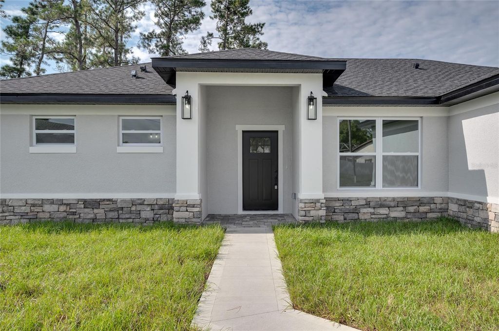 Photo of 1891 Van Allen Circle, Deltona, FL 32738 (MLS # O6373454)