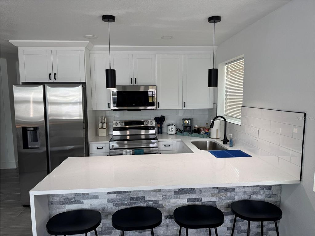 Photo of 111 86th Avenue #1, Treasure Island, FL 33706 (MLS # TB8497317)