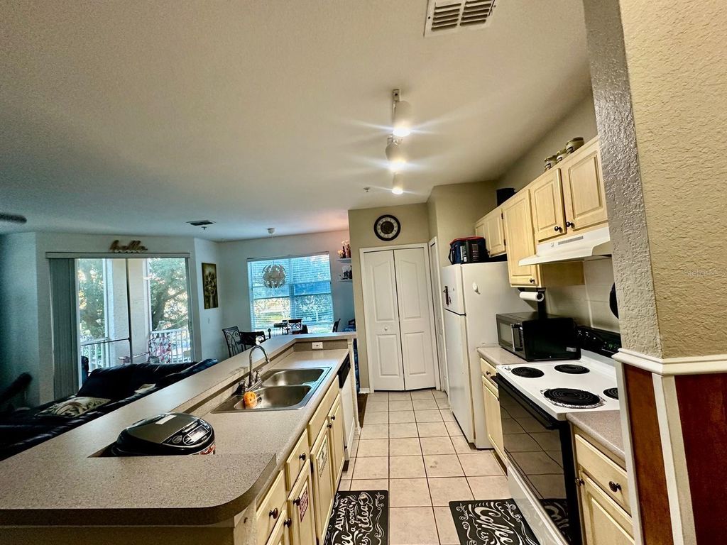 Photo of 2718 Maitland Crossing Way #207, Orlando, FL 32810 (MLS # O6395081)