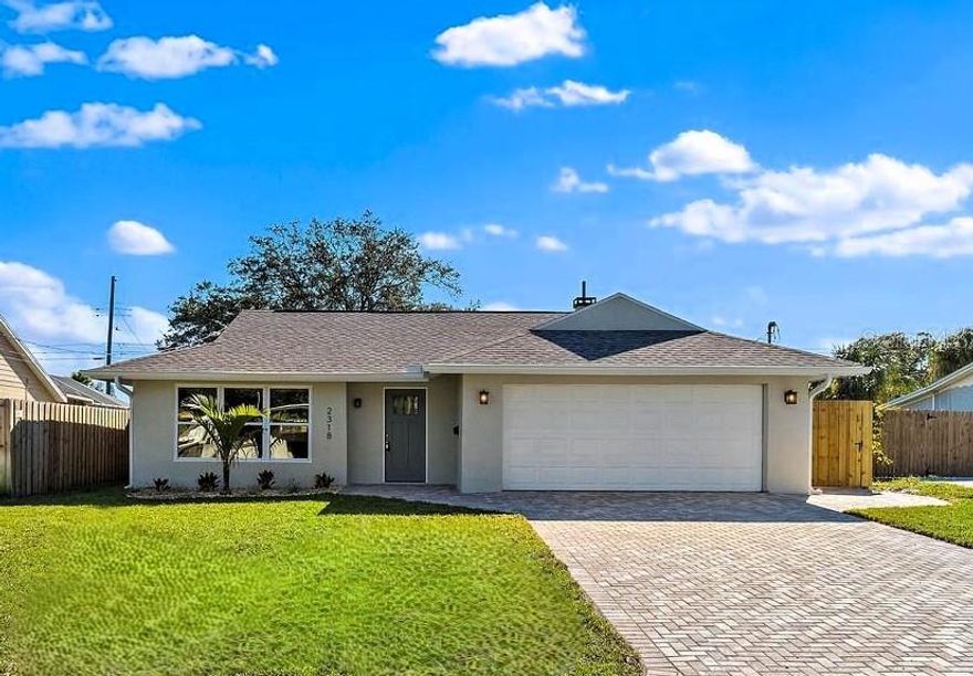 This St. Pete Rental Has Main Character Energy 
Welcome to your new happy place - right in the heart of St. Pete! You’re 2 minutes to the interstate, 8 minutes to downtown, and world – class museums like The Dali museum, parks, shopping, dining, and 14 minutes to the beach, paddling trails for kayaking, extensive paths for cycling and walking - so your commute to fun is officially shorter than your grocery list.
This 3 bedroom, 2 bath, 2 car garage beauty is basically brand - new and ready for you to move in and live your best Florida life. 1,790 sq ft of open, sun - filled space that feels as good as it looks - and oh, it looks amazing.
Step inside and you’ll immediately start wondering if you should take your shoes off.  The open floor plan practically beams sunshine, and that stunning kitchen with quartz countertops and an oversized island will make you feel like you’re in an HGTV reveal episode - minus the camera crew and awkward acting.
Let’s talk highlights:
Brand - new everything - roof, AC, water heater, windows, tile, fixtures, paint, the works. 
 Kitchen of dreams   quartz countertops, a huge island, and plenty of space for cooking, chatting, or pretending you’re on a Food Network show.
Cozy fireplace in the family room - for that one magical week of Florida “winter.”
 Remodeled bathrooms - modern, bright, and fancy enough to make you feel like you should start saying “spa day” instead of “shower.”
Step outside and it gets even better:
 Spacious fenced backyard - perfect for BBQs, cornhole, or literally anything. 
New paver patio - your future outdoor dining room.
No mowing! Grass maintenance is included, so your weekends are free for literally anything else.
Alley access - great for your boat, camper, or the friend who always “just needs to park for a few hours.”
Laundry? Already handled - washer and dryer are in the garage.
This home is like new, absolutely  beautiful, and completely ready for you - bright mornings, cozy nights, and everything in between. Come fall in love before someone else does (and starts posting about it on Instagram).