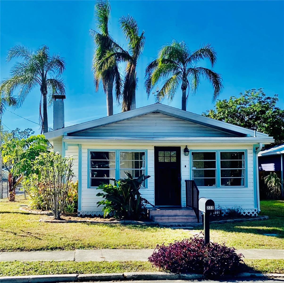 Location, Location! Motivated Seller offering $5k closing cost credit to Buyer. Charming and updated 1925 bungalow on a corner lot west of Manatee Avenue near Bradenton's historic River district. 2 bedroom 1 bathroom with den/dressing room/nursery/office located off of the primary bedroom. Updated eat in kitchen and enclosed sunroom. Tile and luxury vinyl throughout. Wood burning fireplace in the living room. Detached one car garage with attached workshop/storage. Home is not located in an HOA. Schedule your private showing today!