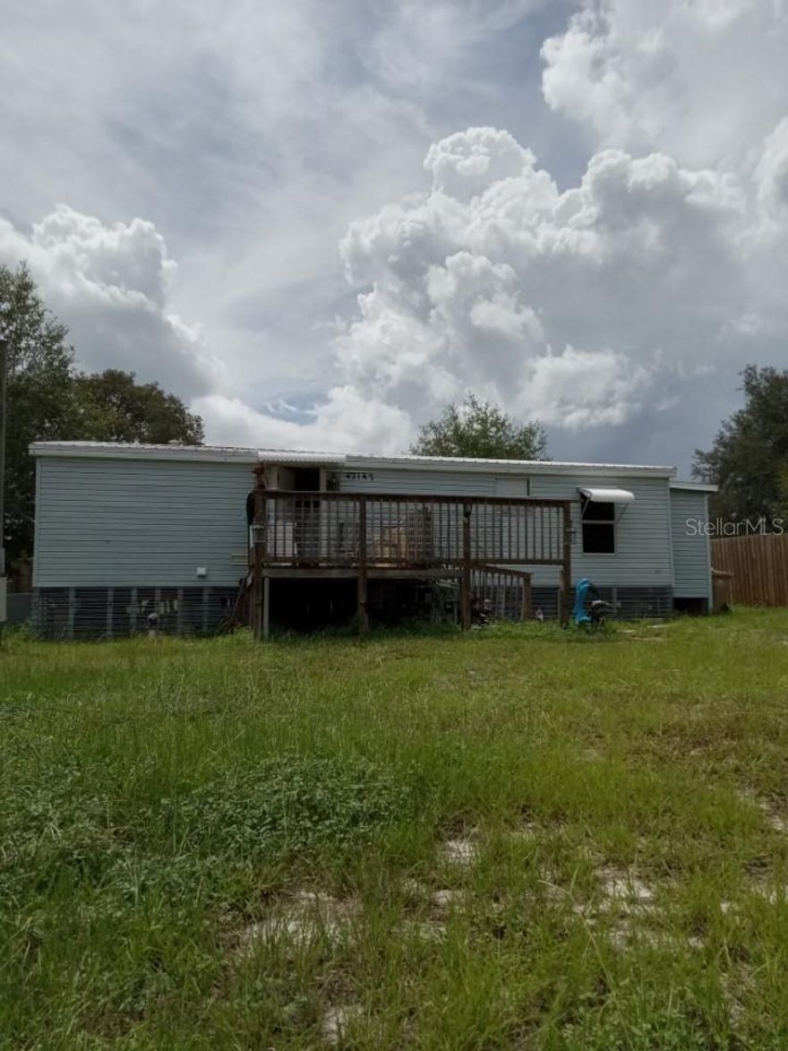 Mobile Home (Double Wide) with updated roofing! This 3-bedroom, 2-bath residence offers 960 sq. ft. of comfortable living space on a spacious lot in DeLand with no HOA. The home features a durable metal roof (2017) and a freshly shingled addition completed just 3 months ago, providing peace of mind for years to come.
Inside, you’ll find a bright and functional layout with cozy living areas, a practical kitchen, and well-sized bedrooms. The expansive yard offers endless possibilities—perfect for entertaining, gardening, or parking. Conveniently located near shopping, schools, and major roadways.

It will need TLC. This is a fixer upper an a great investment opportunity. All offers are welcome.
