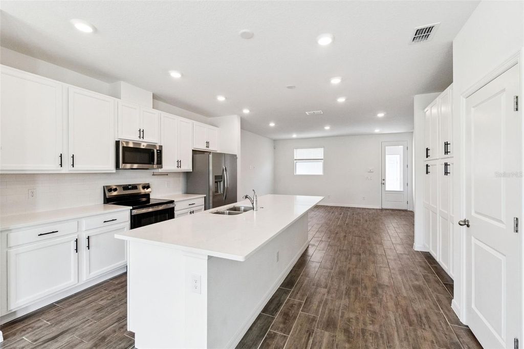 Photo of 6479 Trailblaze Bend, Saint Cloud, FL 34771 (MLS # O6403510)