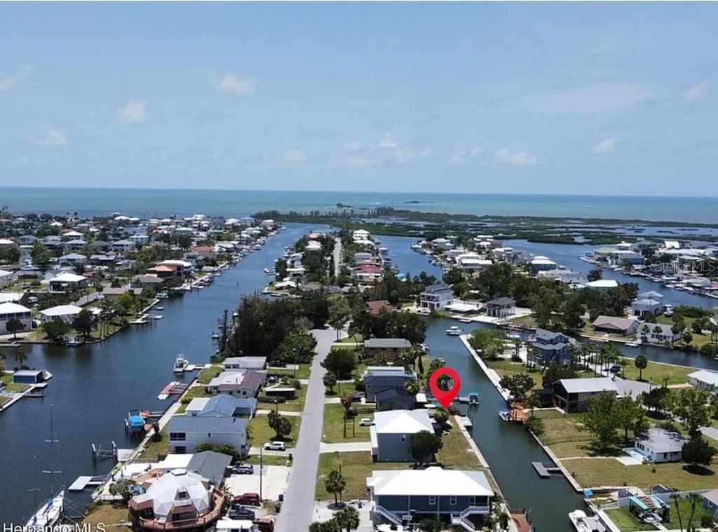 Photo of 4977 Cedarbrook Lane, Hernando Beach, FL 34607 (MLS # S5136809)