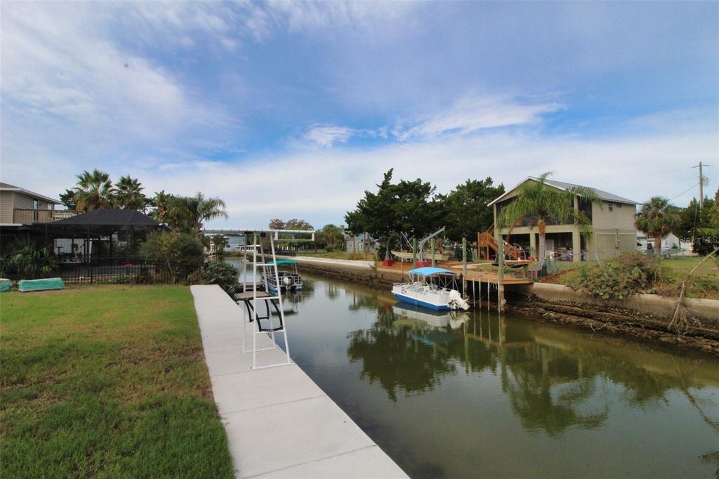 Photo of 4977 Cedarbrook Lane, Hernando Beach, FL 34607 (MLS # S5136809)
