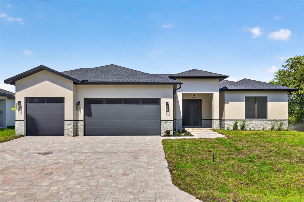 Photo of 9668 President Circle, Port Charlotte, FL 33981 (MLS # O6431444)