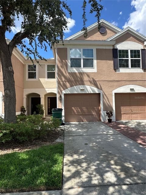 Photo of 26541 Chimney Spire Lane, Wesley Chapel, FL 33544 (MLS # TB8392429)