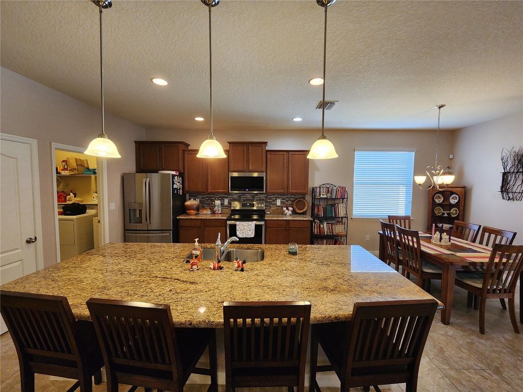 Photo of 1941 Wind Meadows Drive, Bartow, FL 33830 (MLS # L4957904)