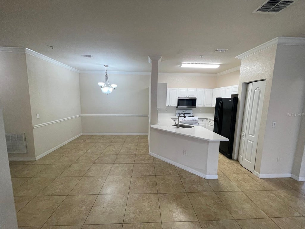 Photo of 3355 S Kirkman Road #1311, Orlando, FL 32811 (MLS # O6441575)
