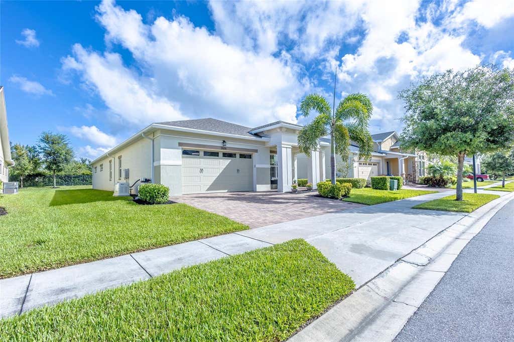 Photo of 2606 Meadowedge Loop, Saint Cloud, FL 34772 (MLS # O6423184)