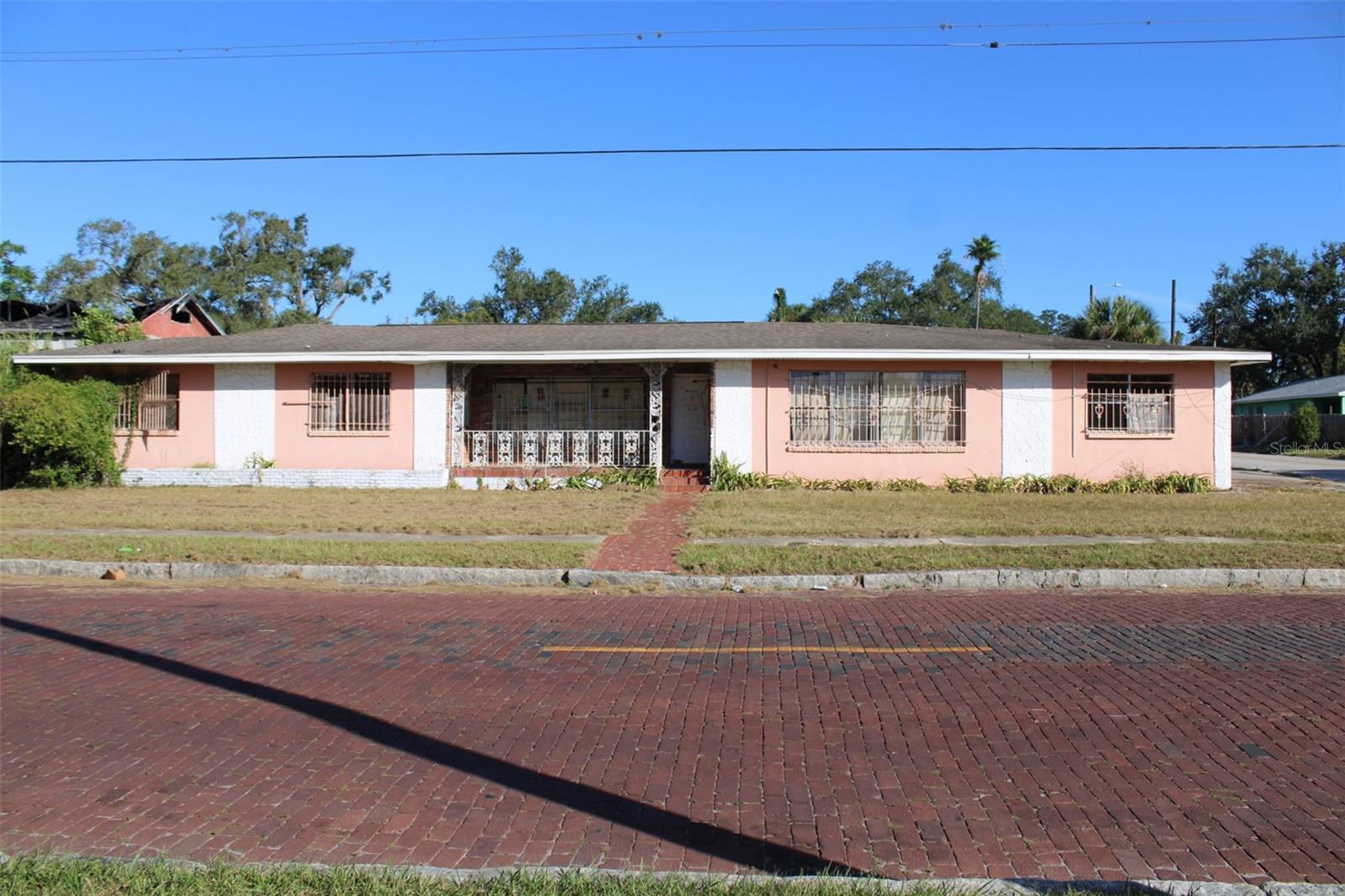 Be in the Know — and the Now! Located in the heart of the Robles Park Village Redevelopment, this nearly half-acre parcel offers an exceptional opportunity for investors and developers alike. Those who waited to confirm the redevelopment plans can now move confidently — demolition began in September 2025, officially launching one of Tampa’s most transformative projects. The surrounding area has been re-zoned to RM-35, and the highly anticipated $800 million Wellness Hub redevelopment is scheduled to begin construction in April 2026. Property Details, Parcel Size: 17,160 sq. ft., Additional Adjacent Land Available: 19,185 sq. ft., Total Combined Land: Approximately 0.83 acres (corner lots), Location: Central to major Tampa destinations This property is ideally positioned for residential or mixed-use development, offering flexibility and strong potential for appreciation as the neighborhood continues to evolve. The Location is 7 minutes to Armature Works, 8 minutes to The Straz Center for the Performing Arts, 8 minutes to Historic Ybor City, 9 minutes to Raymond James Stadium, 11 minutes to Tampa International Airport, 12 minutes to Seminole Hard Rock Hotel & Casino The Investment Opportunity with major redevelopment, rezoning, and infrastructure already in motion, this parcel represents a ground-floor opportunity in one of Tampa’s fastest-growing corridors. The land value is positioned to increase substantially as the Robles Park transformation takes shape. Don’t miss your chance to invest in the future of Tampa.