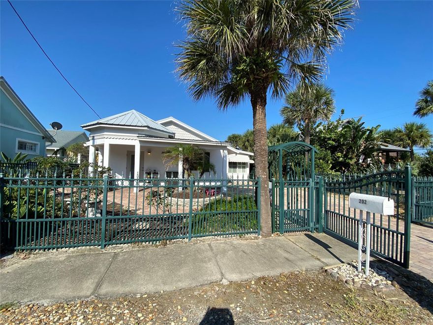 Beachside charming 3 BR 2 Bath (shower is enclosed outside) home completely fenced in front, back, side yards.  Front covered patio and back screened in porch.  Outdoor shed with electric.  Tile and plantation shutters throughout.  Ceiling fans and vaulted ceilings.  This is a perfect location near to Flagler Ave. shops and activity, and about 2 blocks to the beach. ;Water: City