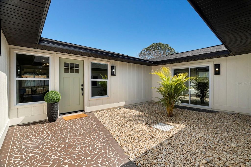 Photo of 6567 22nd Street N, St Petersburg, FL 33702 (MLS # TB8481311)