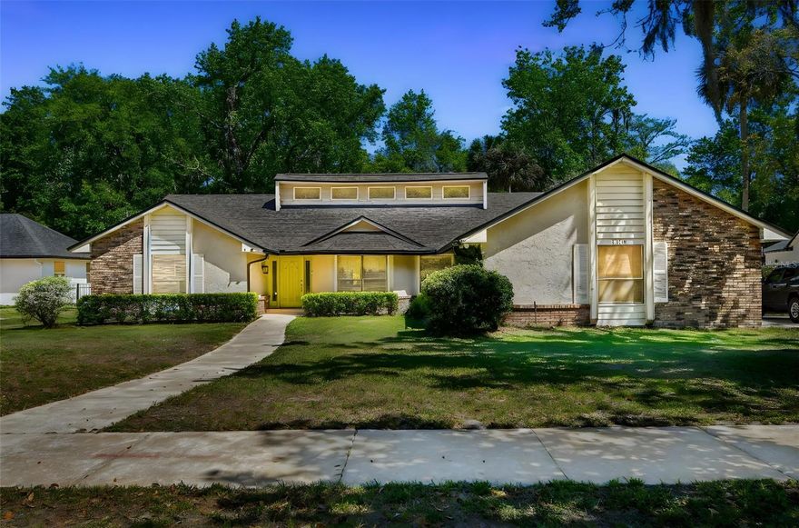 One or more photo(s) has been virtually staged. Welcome to the highly sought-after Tuscawilla community, a neighborhood known for its tree-lined streets, strong sense of community, and access to some of the top-rated Seminole County schools. From the moment you walk through the front door, you’re greeted with an abundance of natural light that fills the home and creates a warm, inviting atmosphere. The front living room offers a flexible space that easily adapts to your lifestyle—whether it’s enjoying slow mornings with coffee, setting up a home office, creating a playroom, or hosting guests. Toward the back of the home, the family room becomes the heart of everyday living with its soaring ceilings, plenty of natural light, and cozy fireplace—an ideal setting for movie nights, game days, or gathering with friends and family. The kitchen sits just beyond the family room, making it perfect for entertaining and staying connected while cooking. Featuring beautiful granite countertops, plenty of white cabinetry, and stainless steel appliances, the space is both functional and stylish, whether you’re preparing weeknight dinners or hosting weekend get-togethers. The split floor plan was designed with both comfort and privacy in mind. Three bedrooms with two shared bathrooms are located on one side of the home, offering the perfect setup for family members, guests, or even a dedicated office or hobby space. On the opposite side, the spacious primary suite serves as your private retreat, featuring a large bedroom, walk-in closet, and a beautifully designed en-suite bathroom with granite countertops, dual vanities, a soaking tub, and a walk-in shower—perfect for unwinding at the end of the day. Step outside to the screened-in lanai and experience the best of Florida living. This peaceful outdoor space is perfect for morning coffee, evening dinners, or simply relaxing while overlooking your expansive backyard. Sitting on over half an acre with no rear neighbors, the property offers incredible privacy and plenty of room for kids and pets to play, future outdoor entertaining spaces, or even a pool. Living in Tuscawilla means enjoying an active and convenient lifestyle. You’re surrounded by beautiful parks, walking and biking trails, golf courses, and community spaces perfect for spending time outdoors. Everyday conveniences like grocery stores, restaurants, and local shops are just minutes away, and with easy access to the 417, commuting to downtown Orlando, the theme parks, or even a quick weekend trip to the beach is effortless. This home offers the perfect balance of space, comfort, and lifestyle in one of Central Florida’s most desirable communities. Schedule a showing today as this home will not last long!