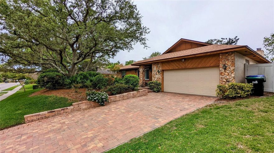 Welcome to this charming 3-bedroom, 2-bathroom home, nestled in the heart of Dr. Phillips. This delightful property boasts an oversized lot, ensuring plenty of space for outdoor activities and enjoyment. With its close proximity to A-rated schools, Sand Lake Restaurant Row, Disney World, Universal Studios Orlando, and major highways, you'll be perfectly positioned for both work and play. As you approach the home, you'll be immediately captivated by the beautiful landscaping, which provides a serene and welcoming atmosphere. Step inside to find a spacious, open floor plan filled with natural light. The living area features a cozy fireplace, creating a warm ambiance for those cooler evenings. The kitchen is a chef's dream, complete with granite countertops, ample storage space and new stainless-steel appliances, making meal preparation a pleasure. The large, covered lanai is perfect for outdoor dining, relaxation, and entertaining guests. It overlooks the expansive, fenced-in yard, providing a safe and secure environment for kids and pets to play. The generously sized bedrooms offer comfort and privacy, with the master suite featuring an en-suite bathroom. The additional two bedrooms are serviced by a second, well-appointed bathroom. This rental property is ideal for families seeking a comfortable, stylish home in a desirable location. With its combination of functionality, beauty, and convenience, this gem in Dr. Phillips is sure to be snapped up quickly. Don't miss this opportunity to make it your new home – contact us today to schedule a viewing.