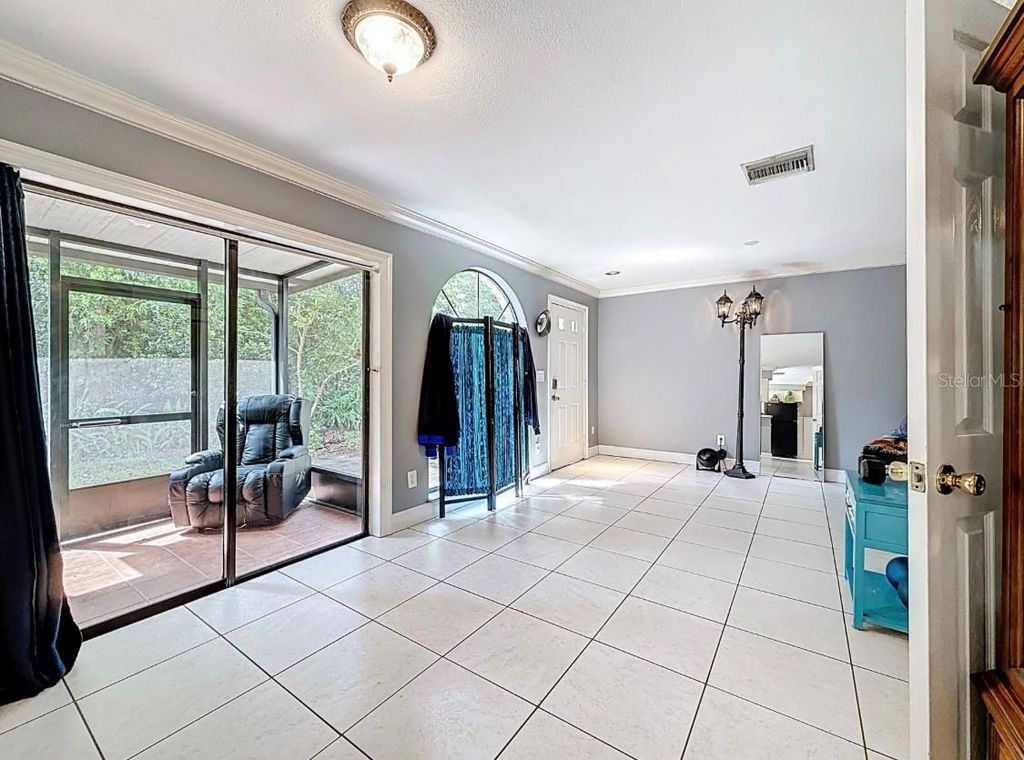 Photo of 3583 Whispering Oaks Lane #110, Palm Harbor, FL 34684 (MLS # TB8490870)