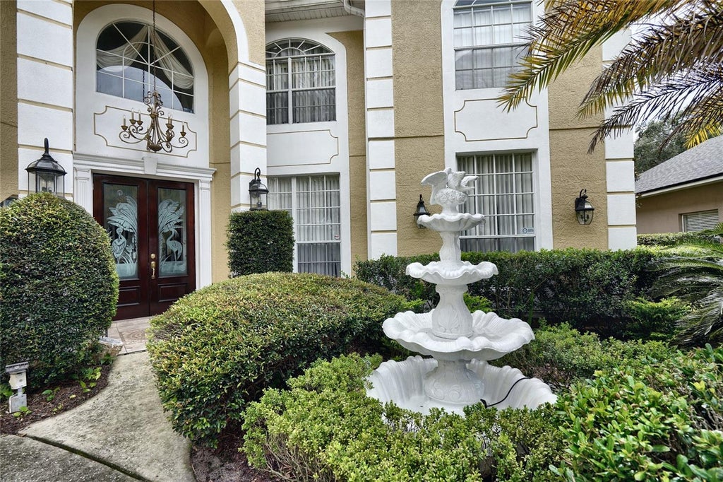 Photo of 7730 Bardmoor Hill Cir, Orlando, FL 32835 (MLS # O6441427)