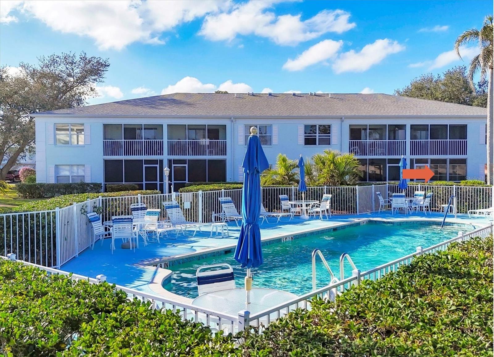 REDUCED TO SELL! Escape to your own slice of paradise with this desirable FIRST FLOOR and END UNIT condominium that has been tastefully updated. Bathed in natural light, this home is perfectly situated right next to the community swimming pool, offering unparalleled convenience for those who want to take a refreshing dip at a moment’s notice and soak up Florida's warm year-round sunshine. Imagine stepping out your door and being just a few steps away from lounging poolside with a cool drink in hand. It’s the perfect retreat, whether you are looking for a full-time residence or a seasonal escape. The spacious kitchen is a chef’s delight, featuring granite countertops, premium stainless-steel appliances, a large closet pantry, and a breakfast bar overlooking the open concept living and dining area, the ideal set up for hosting guests or enjoying family dinners. Plus, a cozy breakfast nook provides the ideal spot to sip your morning coffee. The split-bedroom layout ensures that you and your guests each have your own personal retreats. The generous master suite boasts room for a king size bed and features two spacious closets, an ensuite bath with a large step-in shower, and a sliding glass door leading directly to your private screened lanai. The guest quarters offer a 2nd bedroom, full bath with tub/shower combination and a laundry closet just outside with a pocket door that creates a secluded oasis for privacy and convenience for your guests. This maintenance free community includes grounds care, pest control and WATER AND SEWER INCLUDED in your low $270/monthly HOA fees and a NEW ROOF was installed in 2023 for added peace of mind. With no rentals allowed in the community, you can rest assured that your new Florida home will remain private and peaceful. Nestled in North Port, one of the fastest-growing cities in the country, you are just minutes from exciting entertainment and recreation. Explore the newly developed Downtown Wellen Park, where you will find waterfront dining on an 80-acre lake, live concerts, a weekly farmers market and The Braves Spring Training stadium for a fun filled day with family and friends. Nearby, CocoPlum Village Shoppes offer a variety of restaurants and retail stores, and the pristine Venice Beaches are just a short drive away. Schedule a showing today for Florida living at its best, surrounded by friendly neighbors and endless opportunities to enjoy the Florida lifestyle you have always dreamed of.