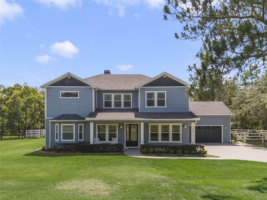 Tucked away in the peaceful countryside of rural Clermont, this stunning custom-built pool home features 4 bedrooms, 3.5 bathrooms, and sits on an expansive 3.25-acre estate within an exclusive, private gated community. As you approach the property, the impressive open-concept layout immediately captures your attention, highlighted by soaring ceilings and oversized windows that bathe the home in natural light. The gourmet kitchen—complete with top-of-the-line appliances—is a chef’s delight, while the spacious living area offers an ideal space for hosting gatherings or relaxing with family. It’s easy to imagine cozy nights spent playing games around the stone-clad, wood-burning fireplace.
Each bedroom provides exceptional comfort, and the primary suite includes a spa-inspired bathroom designed for total relaxation. Outdoors, a custom saltwater pool with a sun shelf and elegant water features anchors the beautifully landscaped backyard, offering endless enjoyment under the Florida sunshine.
This residence delivers not just a home, but a lifestyle—combining privacy, luxury, and tranquility in one of Clermont’s most desirable rural locations. It comes fully equipped with every modern convenience: a state-of-the-art security system, hardwired high-speed fiber optic network, RG-6 video prewiring, whole-house audio, LED lighting, and advanced smart-home automation.
Transition seamlessly from high-end indoor living to the quintessential Florida outdoors by taking a short walk to your private firepit. Environmentally conscious owners will appreciate the built-in electric vehicle charger located in the oversized garage. Concerned about storm season? This home includes a dedicated media room engineered as a fortified storm room with concrete walls and a windowless design to provide peace of mind.
Don’t miss your chance to experience this exceptional property. Schedule your showing today and explore the extensive list of custom features and luxury details firsthand.