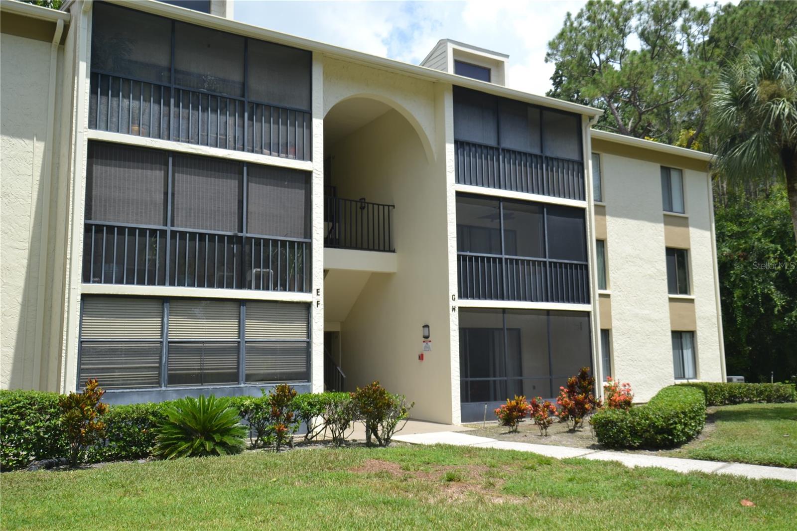 Call to see this exceptional 2nd story end-unit condo in the highly sought-after Pine Ridge at Lake Tarpon. Location, Location, Location! This beautifully updated 2-bedroom, 2-bathroom condo offers peaceful views from your private screened patio ideal for morning coffee or evening relaxation. The desirable split-bedroom floor plan ensures added privacy, and your reserved parking space is just steps from your front door. Enjoy the convenience of a full-size washer and dryer in the unit, and water and trash are included, making this home both comfortable and hassle-free. The Pine Ridge community features a large crystal-clear pool, relaxing spa, and tennis courts at the clubhouse, offering excellent recreational options right at your doorstep. Located just minutes from shopping, dining, and entertainment along Tampa Road and East Lake, with easy access to the airport and the world-famous Gulf beaches. Don't miss the opportunity to live in one of the areas most desirable communities.