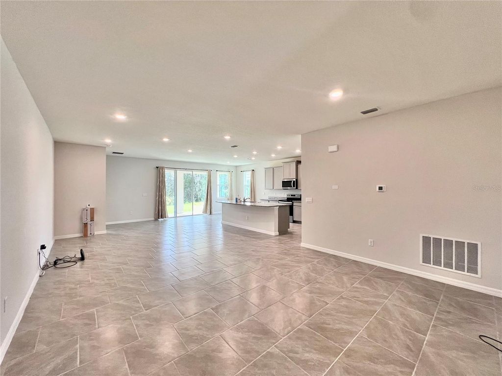 Photo of 33869 Field Maple Loop, Wesley Chapel, FL 33545 (MLS # TB8455386)