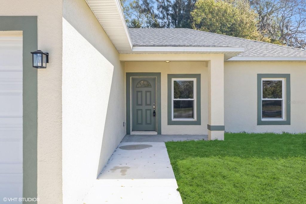 Photo of 613 Dakota Avenue, Saint Cloud, FL 34769 (MLS # O6395680)