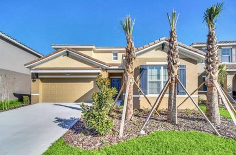 Photo of 7656 Oakmoss Loop, Davenport, FL 33837 (MLS # TB8412239)