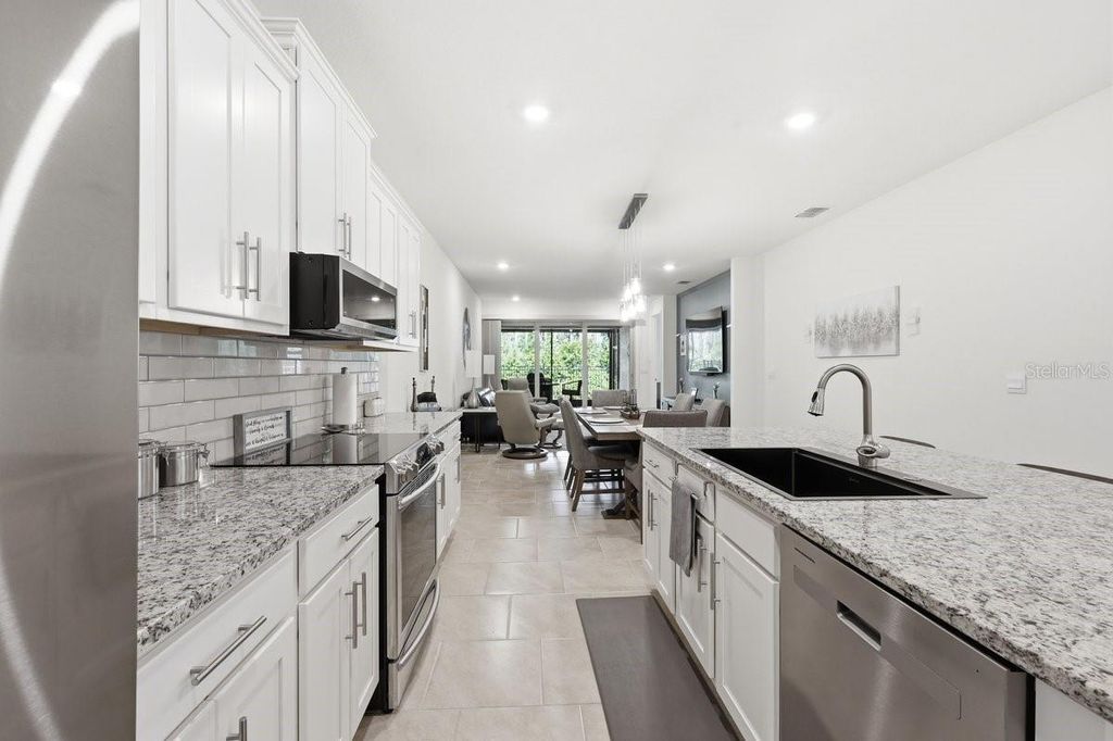 Photo of 3421 Twin Flower Ct, Clermont, FL 34714 (MLS # O6400931)