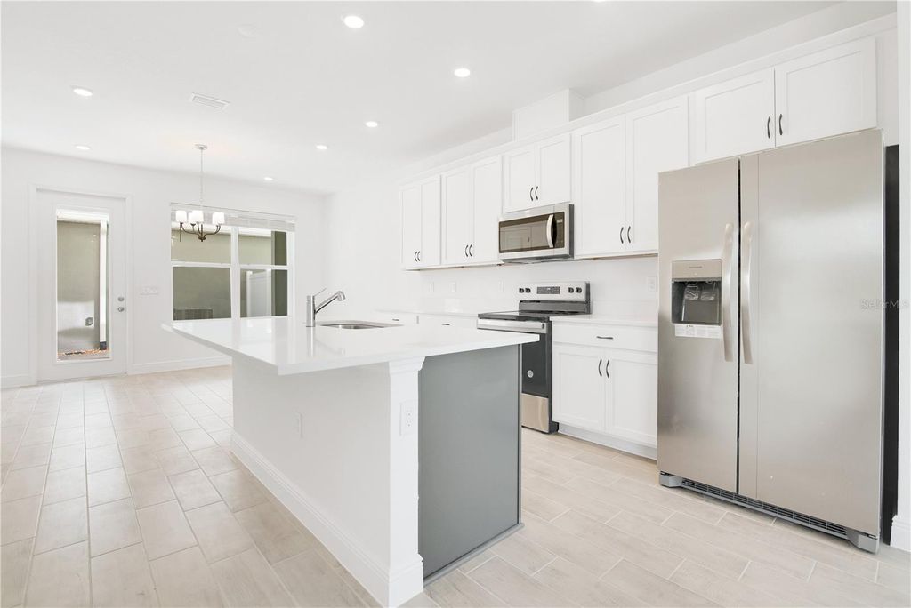 Photo of 13201 Peaceful Melody Drive, Winter Garden, FL 34787 (MLS # O6363080)