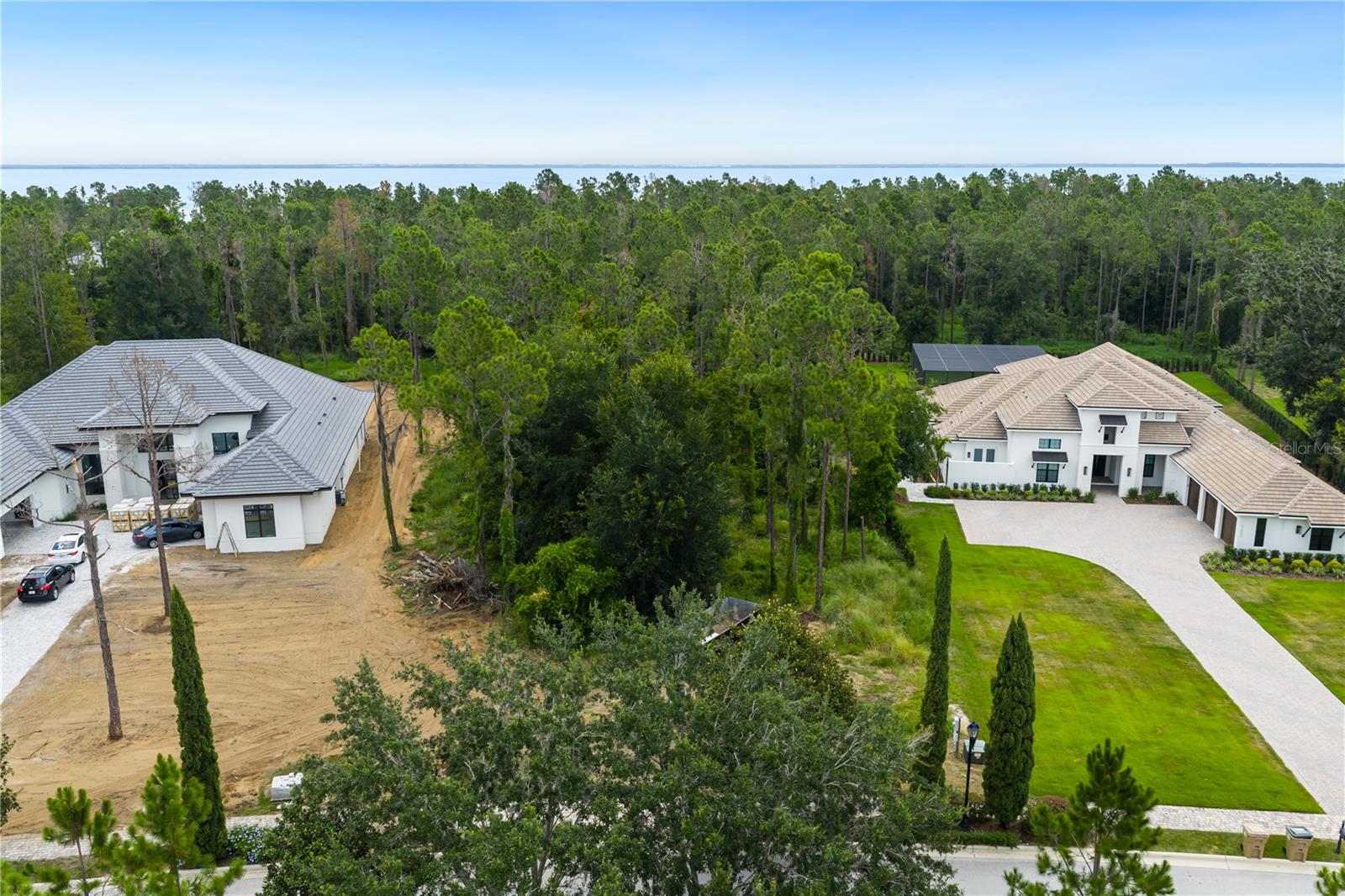 Within the guard gated golf community of Bella Collina, this 1.38 acre wooded homesite located on a one-way street is the perfect fit if you are looking for privacy and plenty of space to enjoy outdoor living. Design your own backyard oasis, perfect for family gatherings and entertaining year-round. With a choice of 7 custom builders, you have the flexibility to design your fully custom home from scratch, or modify any existing plan to suit your needs. With easy access to the Florida Turnpike, 408 and 429 highways, Bella Collina is convenient to all that Central Florida provides. Just minutes from downtown Winter Garden and West Orange bike trails. 1.5 miles from Montverde Academy. Bella Collina features culinary and social activities for all ages year-round, 2 restaurants, tennis and pickleball courts, spa, outdoor pool complex and well-equipped fitness center with 20 complimentary fitness classes a week. Seller is paying the $40,000 Sports Membership Deposit on behalf of the Buyer at closing. all today to preview this homesite and learn about the lifestyle offered in Bella Collina