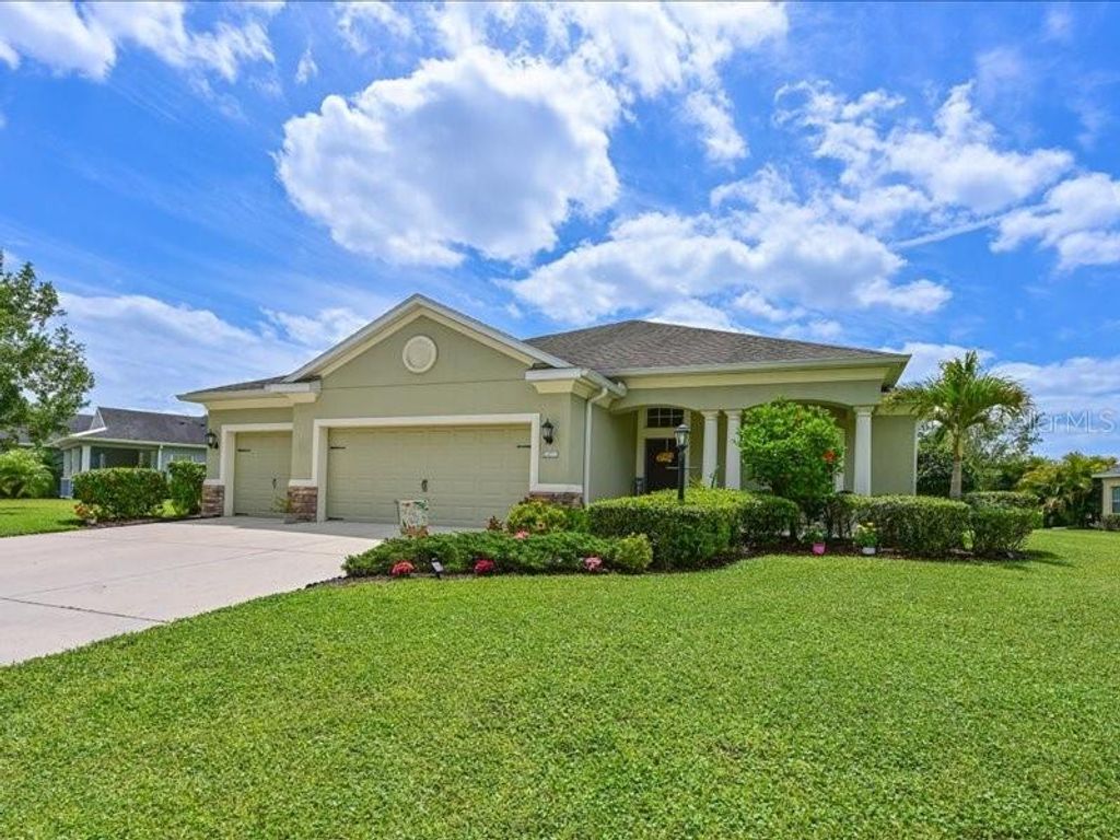Photo of 16711 Rivers Reach Boulevard, Parrish, FL 34219 (MLS # A4649784)