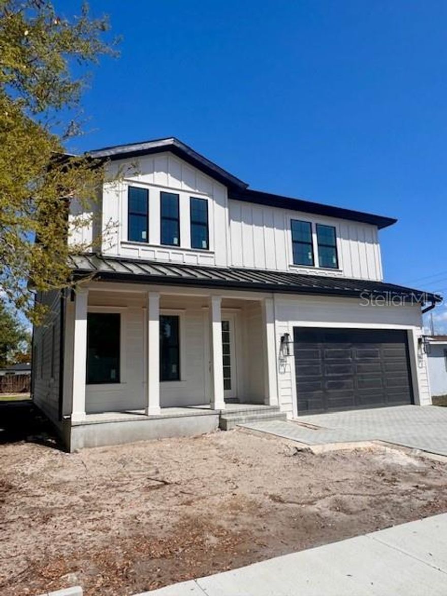 Under Construction. Stunning new construction by Milana Custom Homes in South Tampa, offering 5 bedrooms, 4 full baths, a spacious 2-car garage, and an oversized backyard. Designed with both style and functionality in mind, this thoughtfully crafted two-story home blends timeless architecture with modern living.

The main floor features a bright open-concept layout where the gourmet kitchen with a large center island and abundant cabinetry flows seamlessly into the dining nook and expansive family room. Sliding glass doors open to the covered lanai, creating the perfect indoor-outdoor space for entertaining and everyday living. A first-floor guest suite or private office with a full bath provides flexibility, while a convenient mudroom and walk-in pantry add everyday practicality.

Upstairs, the luxurious primary suite offers a true retreat with a spa-inspired bath featuring dual vanities, a soaking tub, walk-in shower, and an oversized walk-in closet. Three additional bedrooms provide ample space for family and guests, along with a centrally located laundry room for added convenience.

Built with quality craftsmanship throughout, this beautiful new home offers modern comfort and thoughtful design in South Tampa.