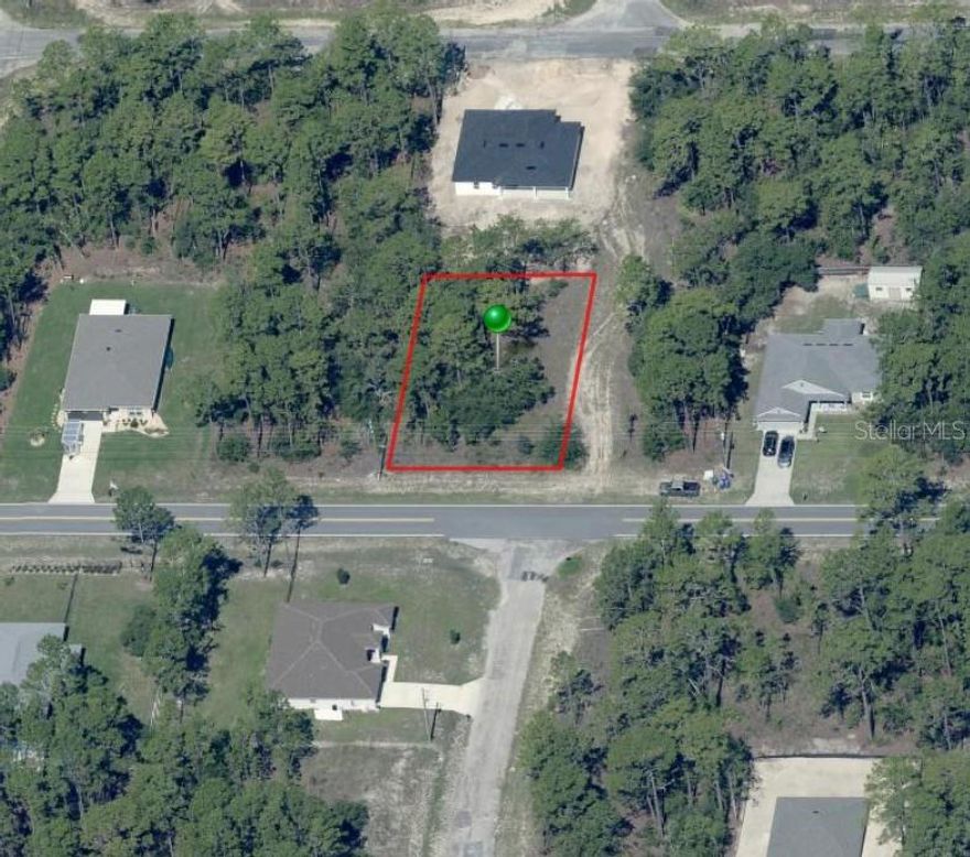 High & Dry vacant lot in booming area of Citrus Springs. Less than 2 miles from the elementary school, the middle school, the community center, golf course, and the Withlacoocheea State Trail. Electric on site. Underground cable on site. Located on a paved road. Very little clearing needed, saving you thousands! There's a reason that all the builders are building in THIS area! Owner owns an additional lot down the street. Purchase both lots for a discounted price!