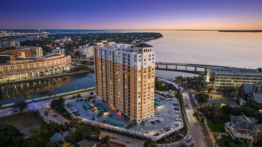 Experience luxury high-rise living at its finest in this immaculately maintained 2-bedroom, 2-bathroom residence on the 18th floor of 345 Bayshore - one of Tampa’s most prestigious waterfront addresses. Newly furnished, turnkey, and freshly painted, this inviting home has been thoughtfully upgraded for comfort and sophistication. The spacious open floor plan is flooded with natural light from floor-to-ceiling windows, and the private oversized balcony offers stunning, unobstructed views of Hillsborough Bay all the way to St. Petersburg. The kitchen features granite countertops, a glass tile backsplash, matching GE appliances, new tile flooring, a new Kohler faucet, and a walk-in pantry with built-ins. Additional enhancements include an in-unit front-loading washer and dryer, two new Samsung 65-inch mounted TVs, a brand-new water heater, white oak wood flooring, three new ceiling fans, new dining area track lighting, a new balcony light fixture, and bar-height patio furniture ideal for enjoying sunrise coffee or sunset cocktails. Contemporary furnishings including a dual-reclining high-performance linen sofa and complementary décor that provide a relaxing atmosphere throughout. 
The serene primary suite offers a new king bed and frame, a custom walk-in closet with built-ins, and coordinated side tables and dresser. The renovated ensuite bathroom includes a double vanity, deep soaking tub, oversized walk-in glass rain shower, travertine finishes, and custom shelving. The split floor plan ensures privacy with the second bedroom currently arranged as a guest room/ office hybrid featuring a new queen bed, premium bedding, an integrated gaming desk, and breathtaking bay views framed by custom wood shutters. The home also includes a fully remodeled powder bathroom with a new vanity, large-format tile flooring, updated lighting, a Kohler swirl-flush toilet. You will also enjoy two premium covered parking spaces - one in the garage and one on the mezzanine level. 
Located on iconic Bayshore Boulevard, the building offers exceptional amenities including 24/7 concierge and security, a recently renovated resort-style pool and spa, outdoor grills, two fitness centers, a sauna, library, business center, conference room with Wi-Fi, a climate-controlled wine cellar, EV charging stations, car wash area, bicycle and paddle board storage, a private laundry room, the option to rent additional storage units or parking, and exclusive access to two on-site guest suites for visiting family or friends. Additional services already included in price are - water, sewer, trash, pest control, and exterior window washing. This refined residence combines modern updates, timeless style, and an unbeatable location near Downtown Tampa, Hyde Park Village, Davis Islands, The Riverwalk, University of Tampa, Armature Works, and Tampa General Hospital just minutes away. 
This exceptional home is available furnished or unfurnished beginning January 15. No pets, non-smoking, 12-month lease. Contact for your private showing - this one won’t last!