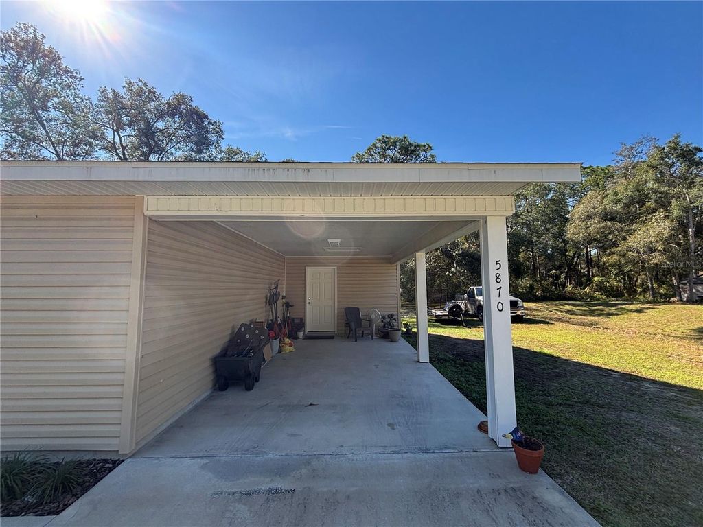 Photo of 5870 SE 171st Court, Ocklawaha, FL 32179 (MLS # OM713783)