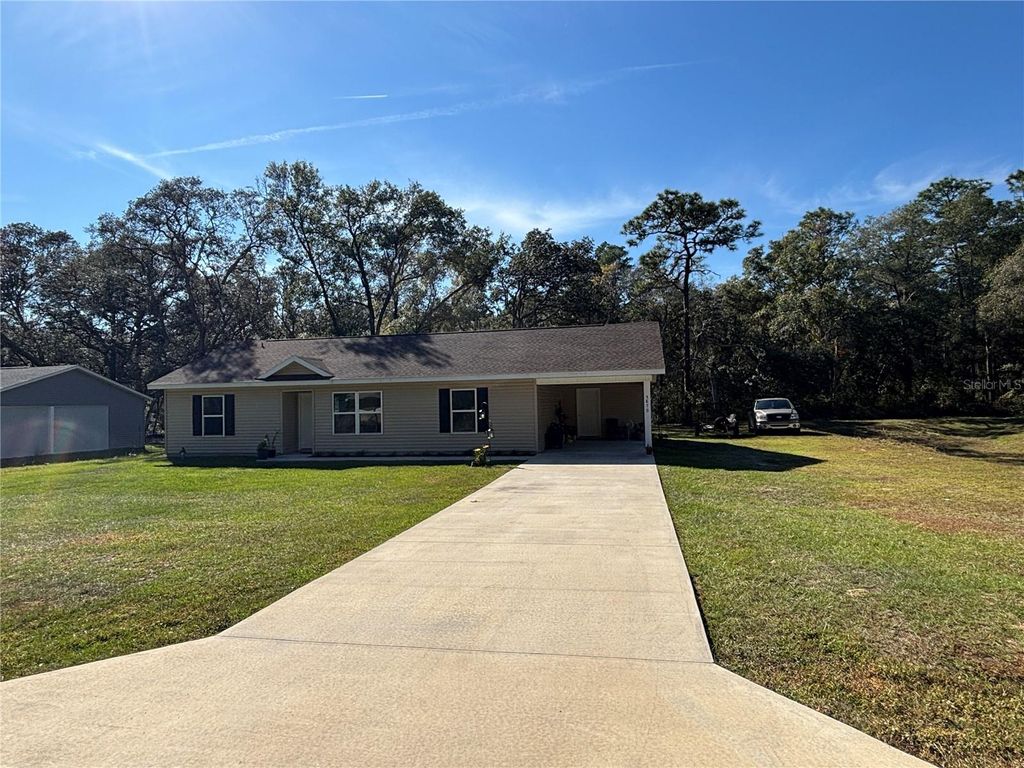 Photo of 5870 SE 171st Court, Ocklawaha, FL 32179 (MLS # OM713783)