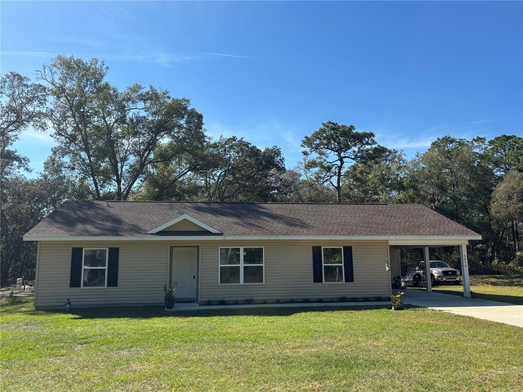 Photo of 5870 SE 171st Court, Ocklawaha, FL 32179 (MLS # OM713783)