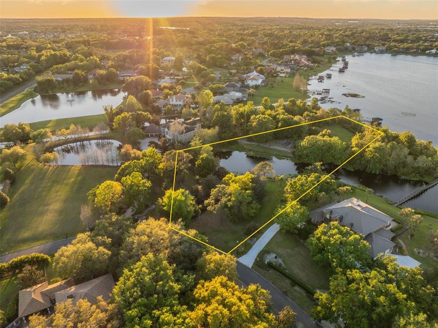 Best Priced Lakefront Lot in Windermere – Now Reduced!

This is your chance to own the most competitively priced lakefront lot in Windermere within a gated community. Nestled in the prestigious enclave of Lake Crescent Reserve at Butler Bay. This exclusive homesite offers unparalleled privacy, nestled between Lake Crescent and a tranquil lagoon, creating the sensation of a private island retreat. A long, winding driveway lined with mature magnolias leads to the expansive buildable homesite, perfectly positioned for breathtaking water views in every direction.  

With existing infrastructure in place—including a slab, large pool, boat dock, irrigation system, well, and septic—this property presents a rare opportunity to build your dream estate while significantly reducing construction costs. Enjoy private lakefront living with access to the Butler Chain of Lakes boat ramp, just minutes away.  

Located in one of Windermere’s most coveted communities, you’re just a short golf cart ride to the Windermere Farmers Market, boutique shops, restaurants, and more. Plus, world-class attractions like Disney, Universal, and Winter Garden’s historic district are just minutes away.  

Seize this opportunity to create a custom luxury estate in one of Central Florida’s most exclusive and picturesque settings. Schedule your private tour today!